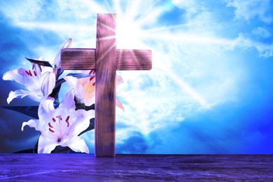 Image of Double exposure of cross with lily flowers and blue sky. Religion of Christianity