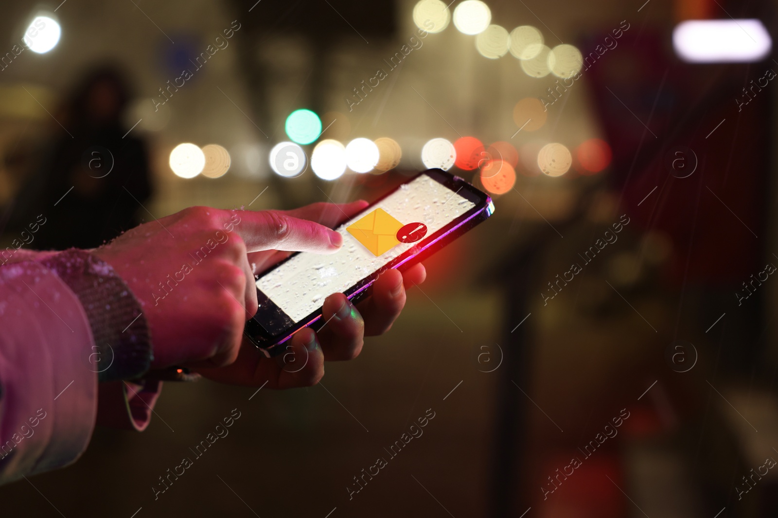 Image of Man using smartphone outdoors, closeup. Spam message notification on device screen, illustration