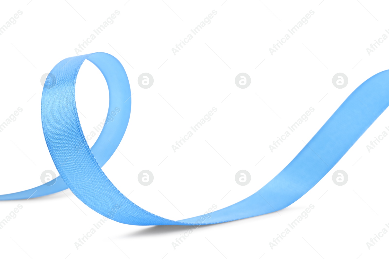 Photo of Beautiful light blue ribbon isolated on white