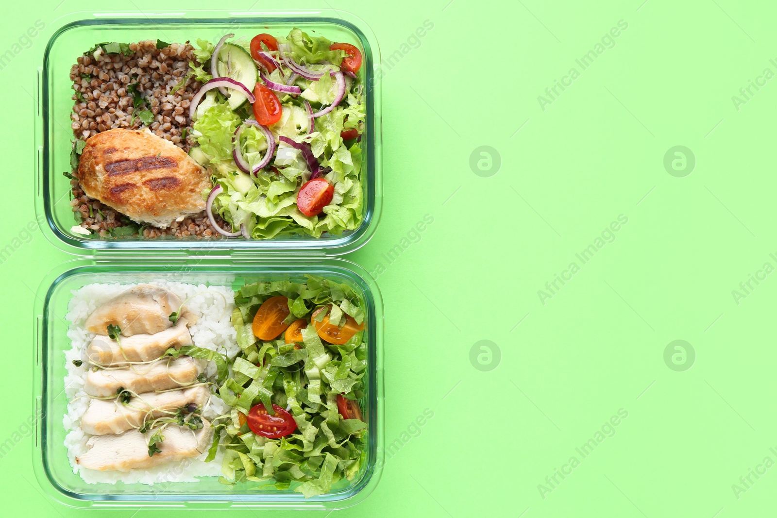 Photo of Healthy food. Different meals in glass containers on green background, top view. Space for text