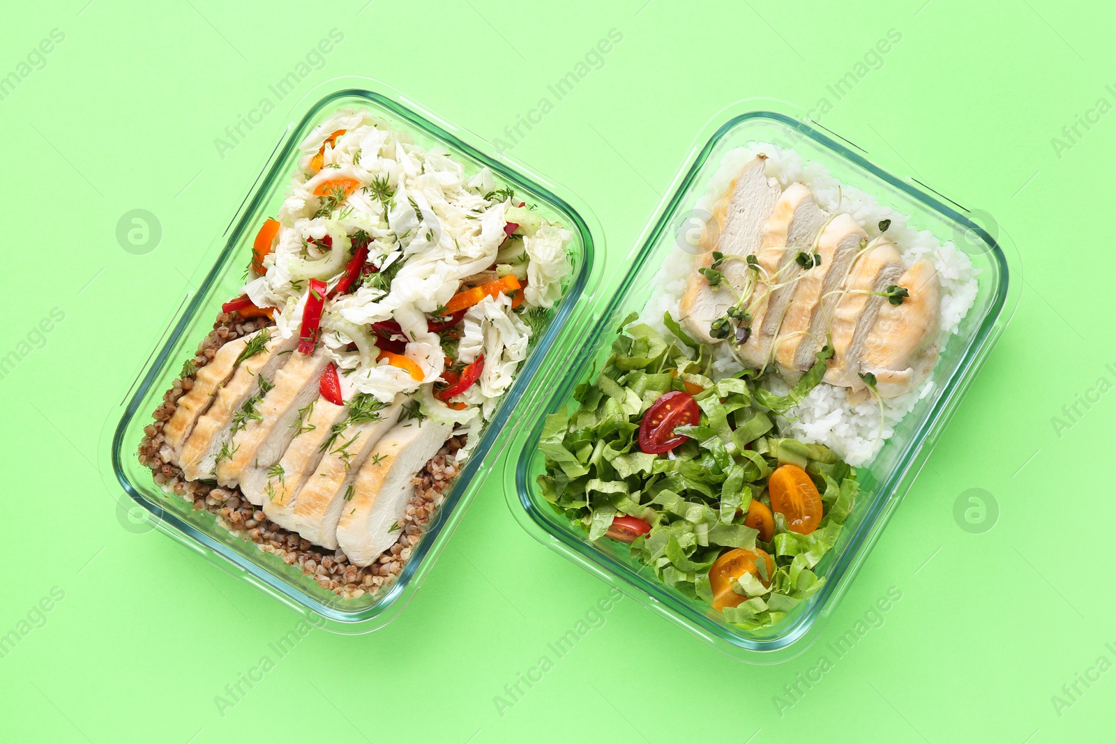 Photo of Healthy food. Different meals in glass containers on green background, top view