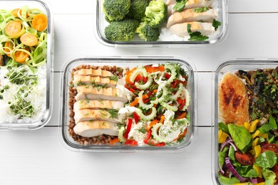 Photo of Healthy meal. Containers with different products on white wooden table, flat lay