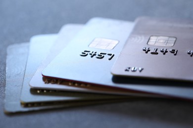 Plastic credit cards on table, closeup view