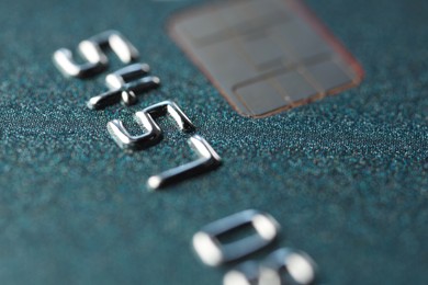 Photo of Plastic credit card as background, macro view
