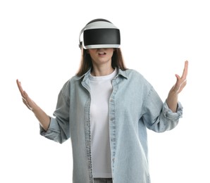 Surprised woman using virtual reality headset on white background