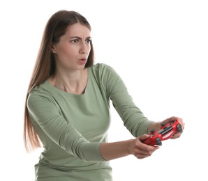 Surprised woman playing video games with controller on white background