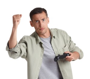 Photo of Unhappy man with controller on white background