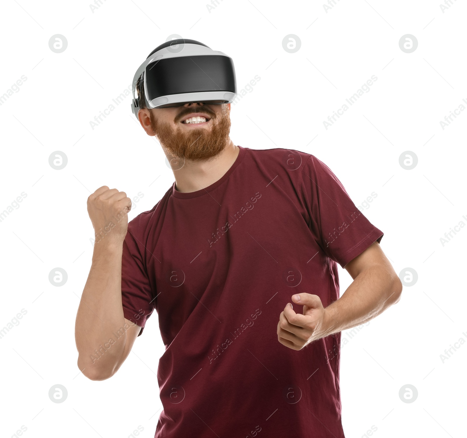 Photo of Smiling man using virtual reality headset on white background