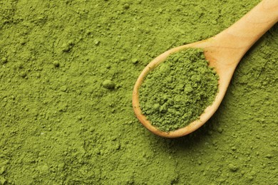 Photo of Spoon and green matcha powder, top view