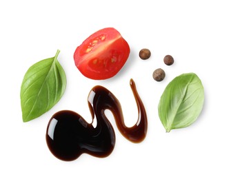 Photo of Delicious balsamic vinegar, tomato, basil and peppercorns isolated on white, top view