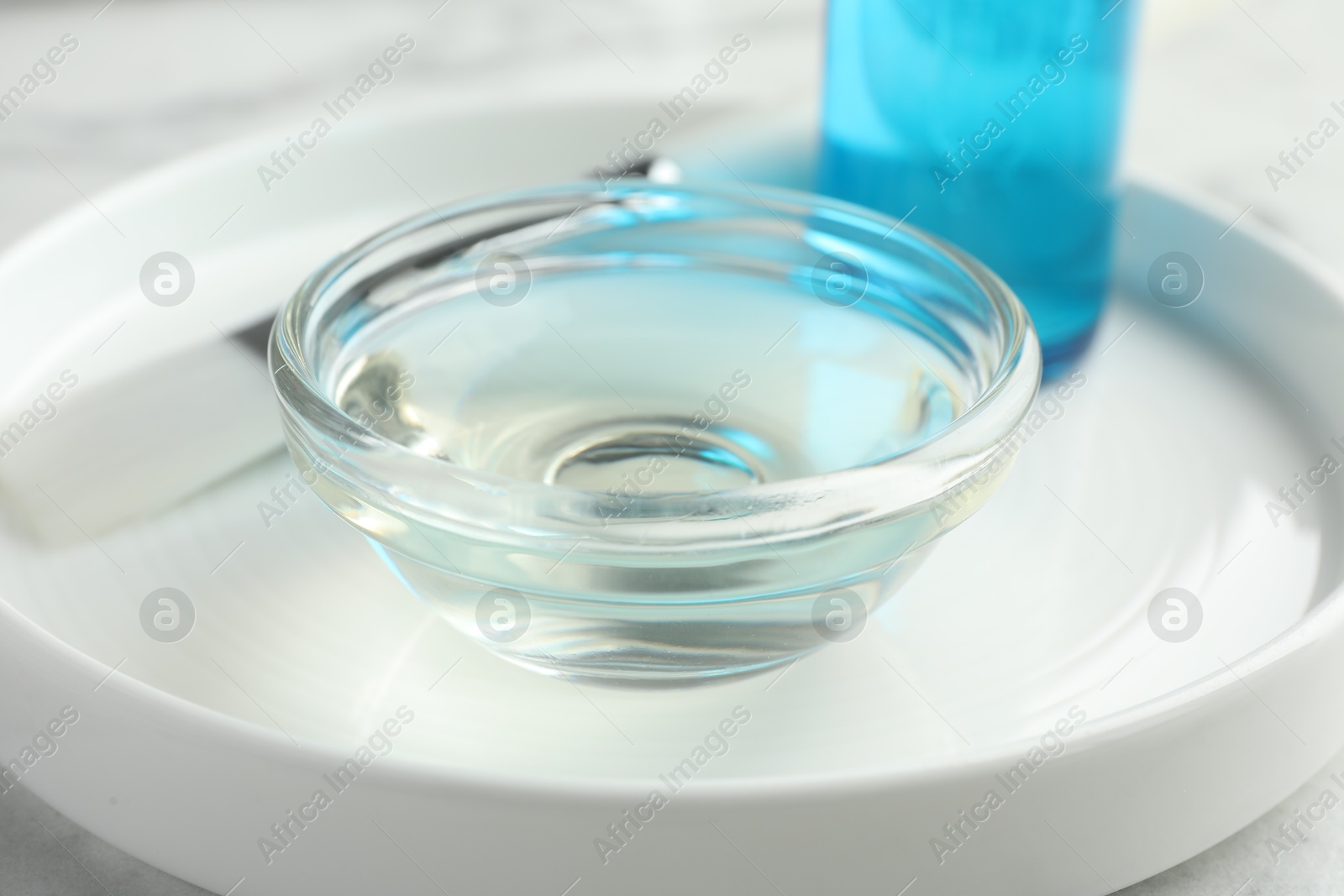 Photo of Bowl of chemical peel on white table, closeup. Peeling procedure