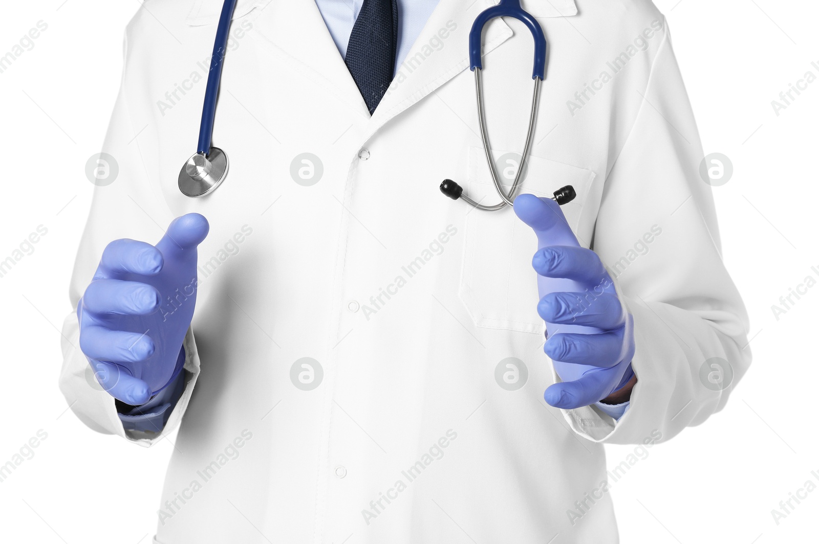 Photo of Doctor in gloves holding something on white background, closeup