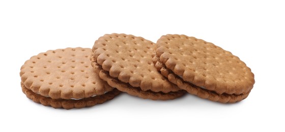 Photo of Three tasty sandwich cookies isolated on white