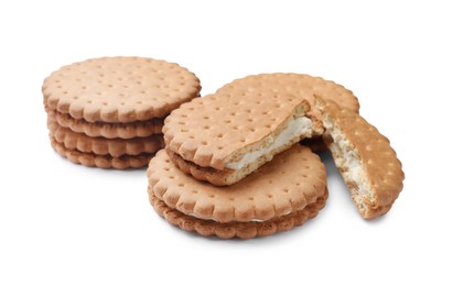 Photo of Many tasty sandwich cookies isolated on white