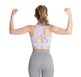Photo of Woman with slim body showing muscles on white background, back view