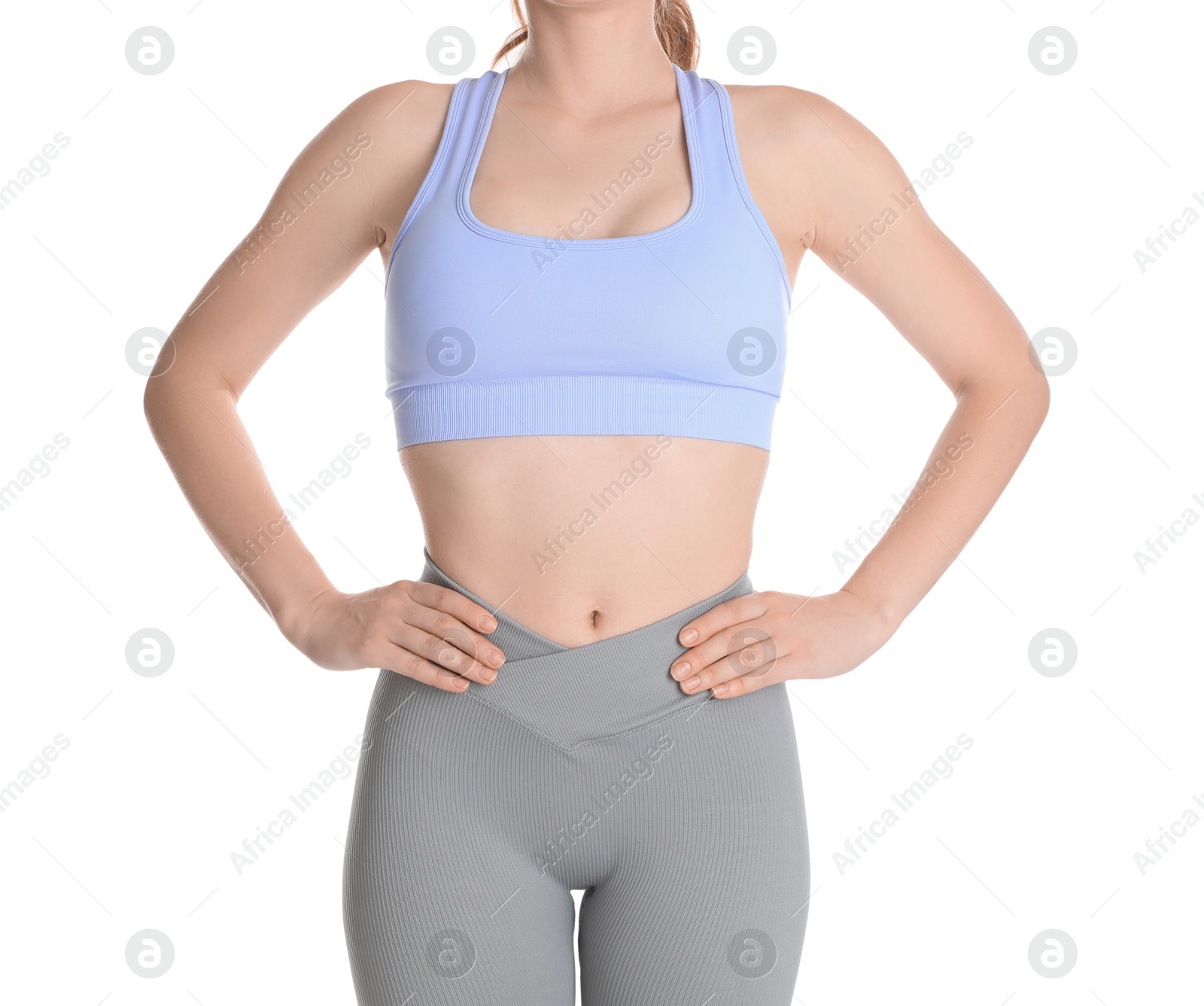 Photo of Woman with slim body posing on white background, closeup