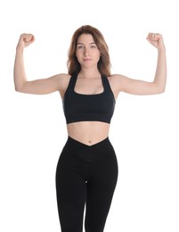 Woman with slim body showing muscles on white background