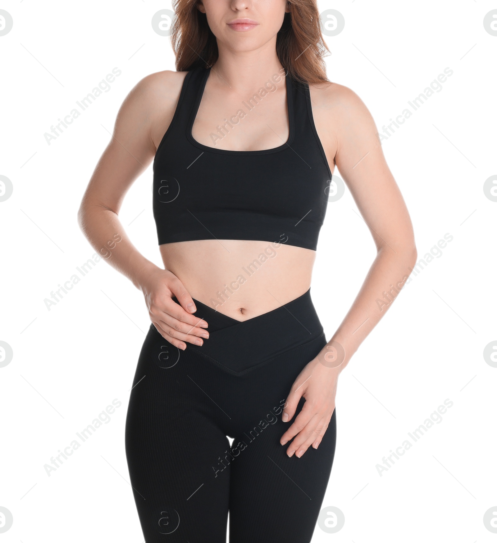 Photo of Woman with slim body posing on white background, closeup