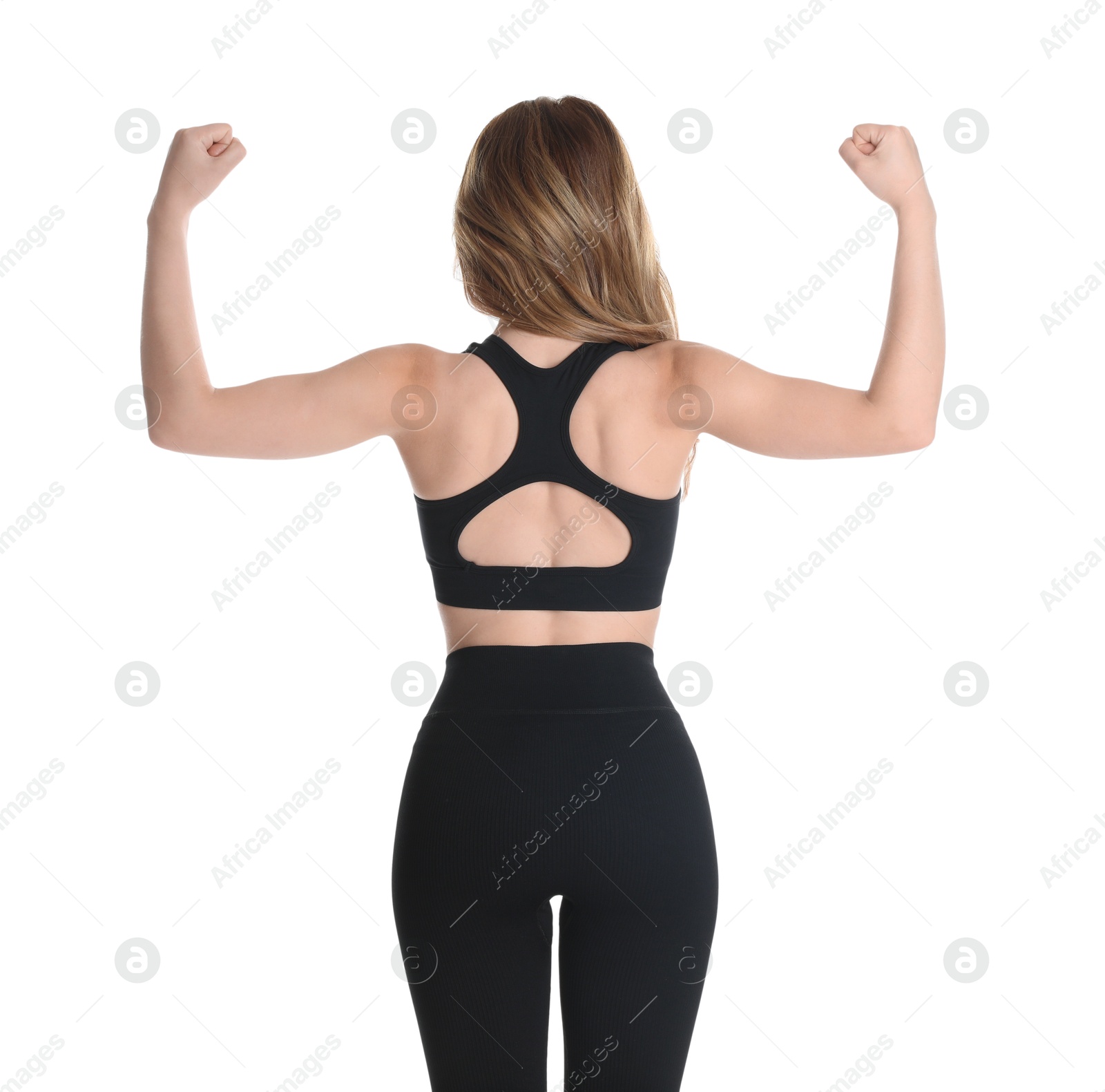 Photo of Woman with slim body posing on white background, back view