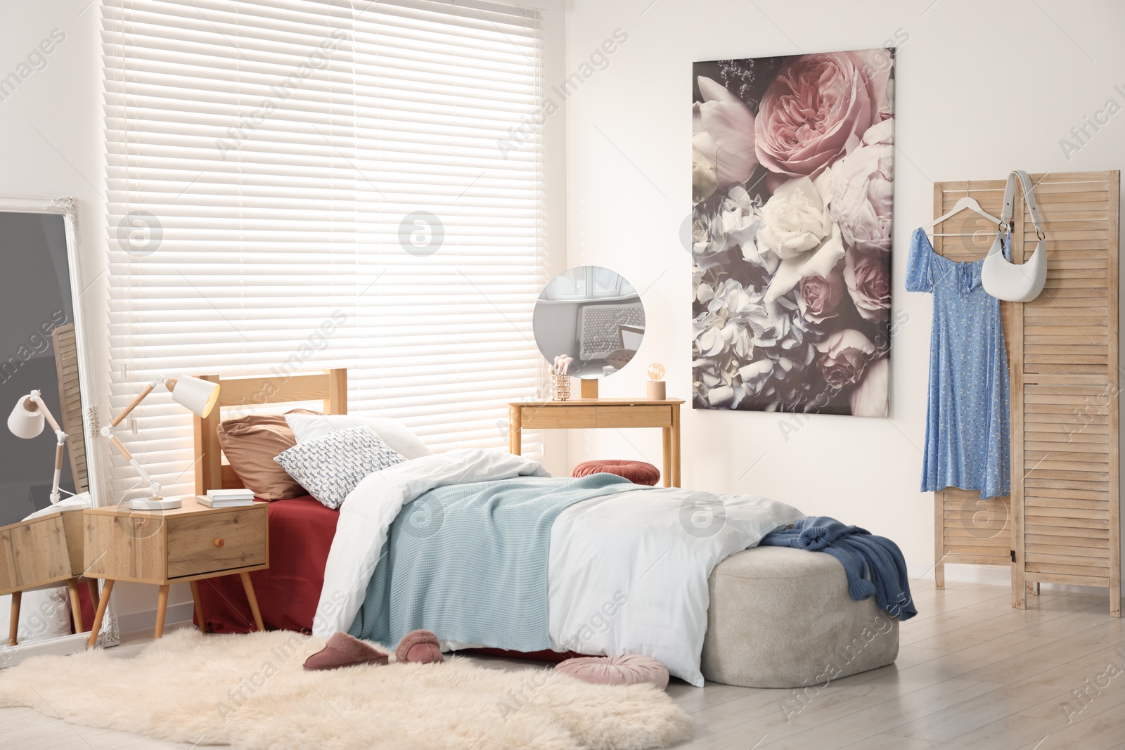 Photo of Teen's room interior with modern furniture and beautiful picture on wall