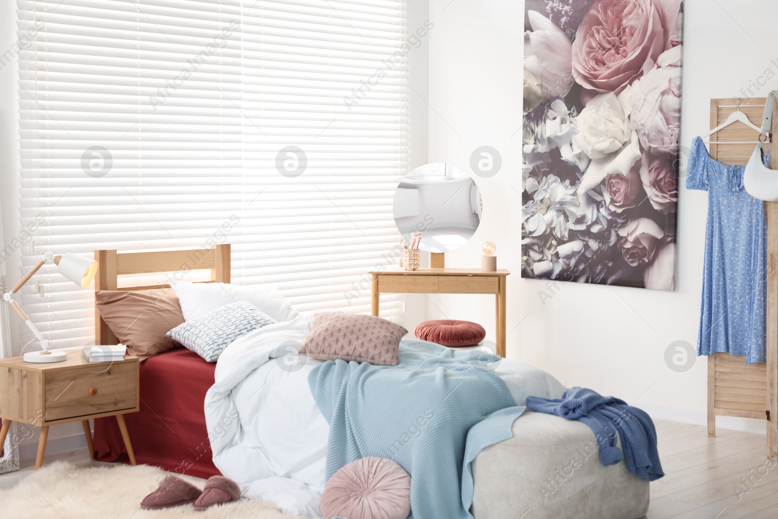 Photo of Teen's room interior with modern furniture and beautiful picture on wall