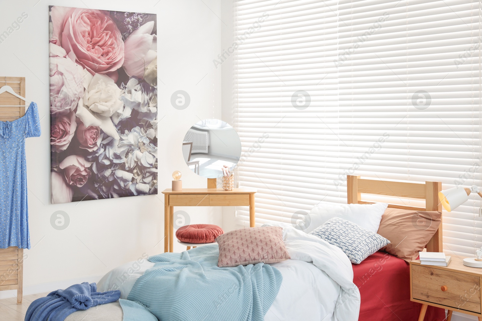 Photo of Teen's room interior with modern furniture and beautiful picture on wall