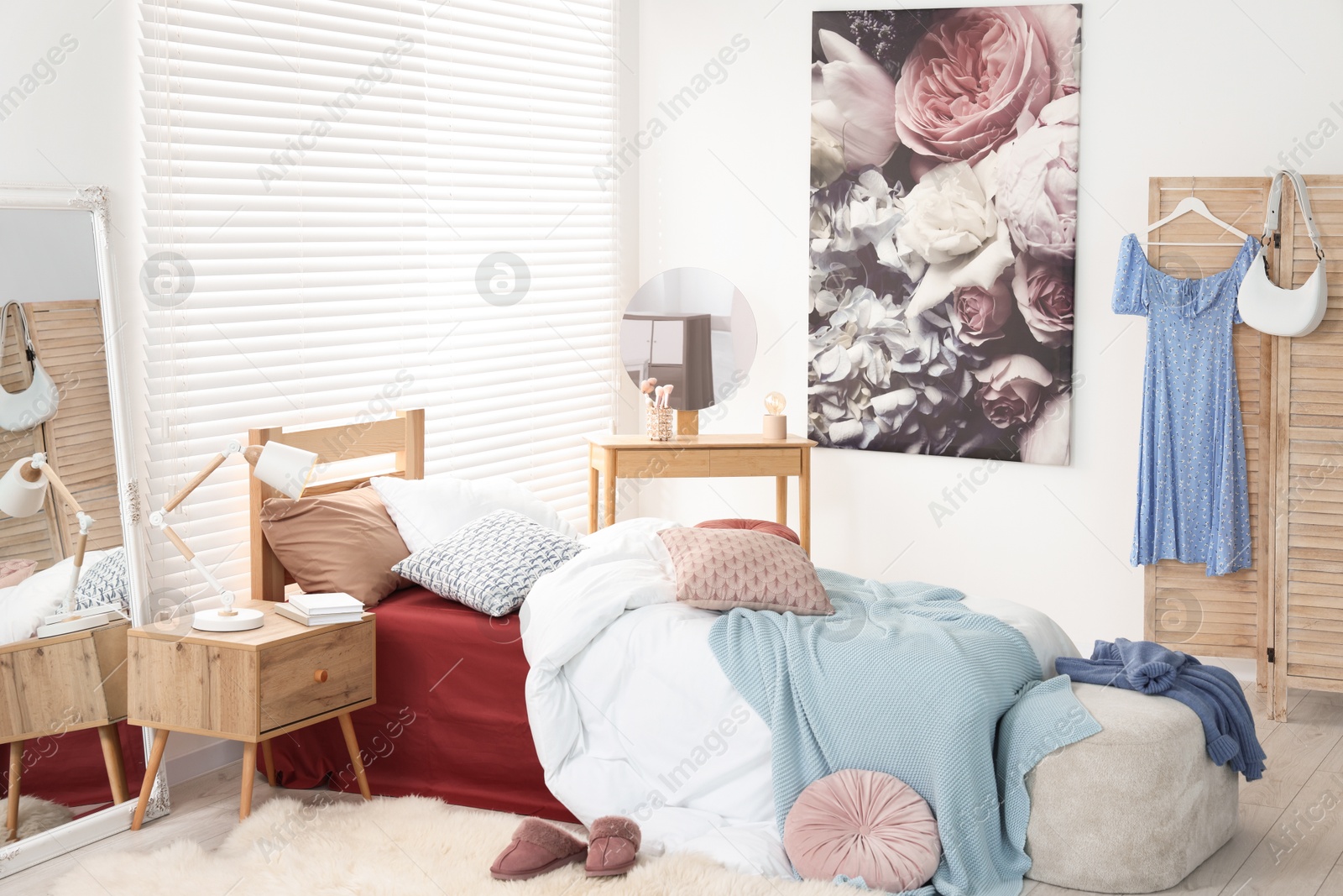 Photo of Teen's room interior with modern furniture and beautiful picture on wall