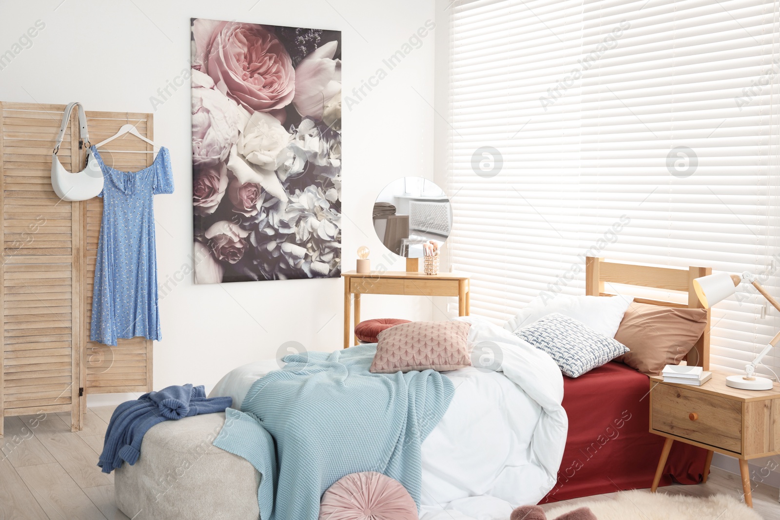 Photo of Teen's room interior with modern furniture and beautiful picture on wall