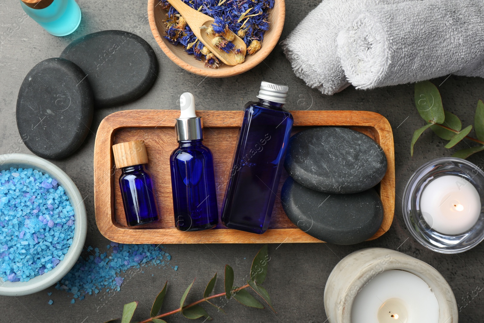 Photo of Flat lay composition with spa products on gray table