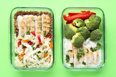 Photo of Healthy food. Different meals in glass containers on green background, top view