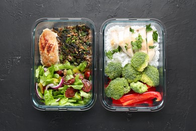 Healthy food. Different meals in glass containers on black table, top view