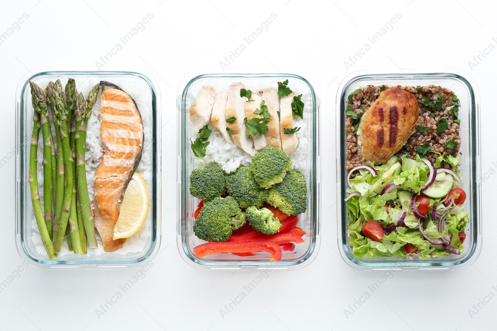 Photo of Healthy food. Different meals in glass containers on white background, flat lay