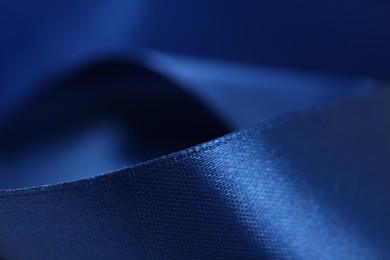 Beautiful blue ribbon as background, closeup view