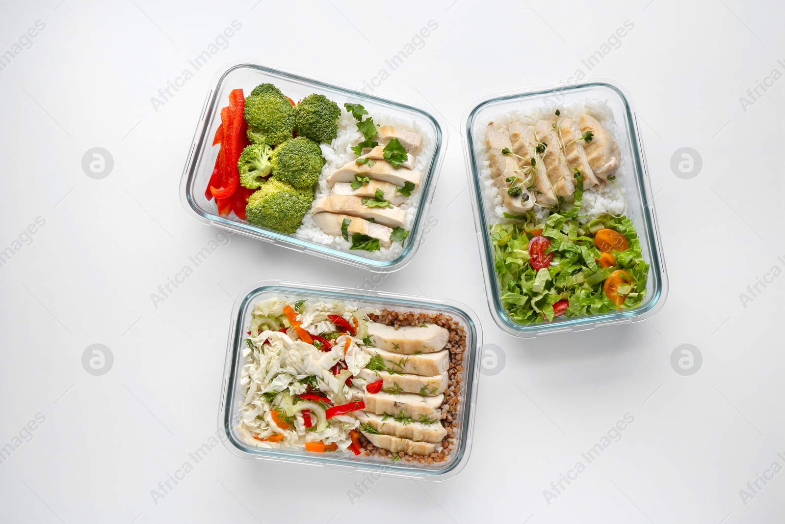 Photo of Healthy food. Different meals in glass containers on white background, flat lay