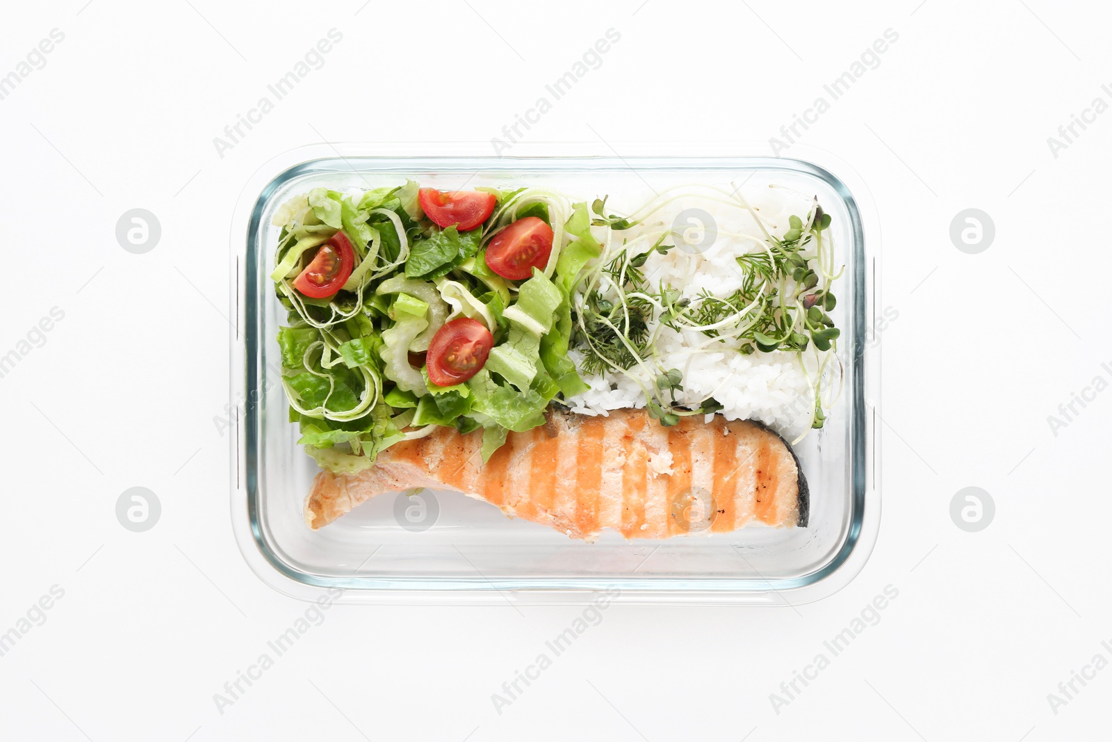 Photo of Healthy meal. Fresh salad, salmon and rice in glass container on white background, top view
