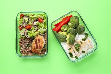 Healthy food. Different meals in glass containers on green background, top view