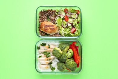 Photo of Healthy food. Different meals in glass containers on green background, top view