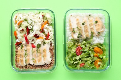 Photo of Healthy food. Different meals in glass containers on green background, top view