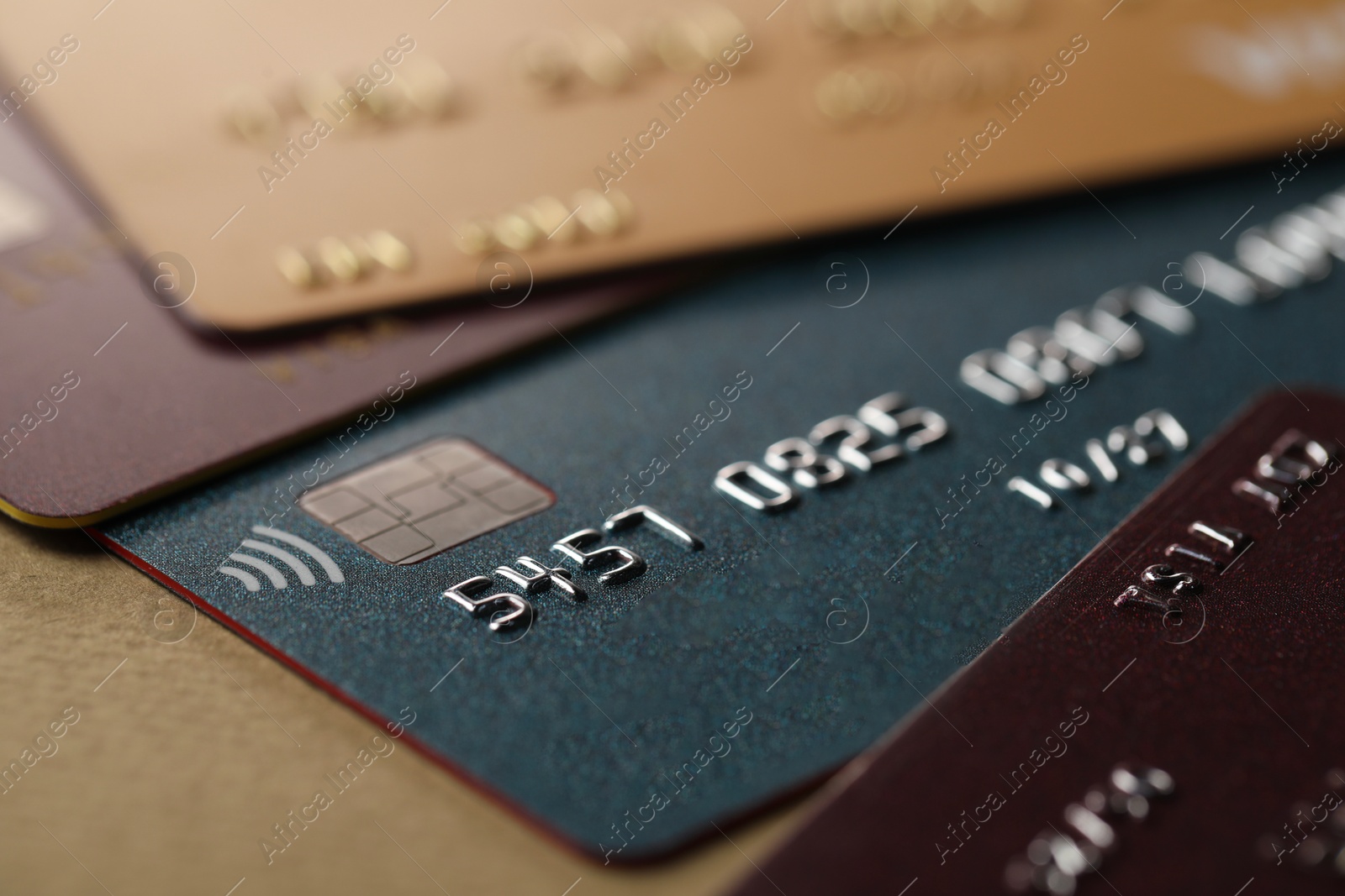 Photo of Different credit cards on table, macro view