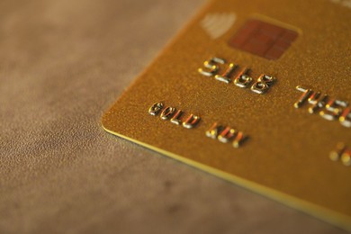Photo of Plastic credit card on table, macro view. Space for text