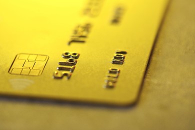 Photo of Plastic credit card on table, macro view