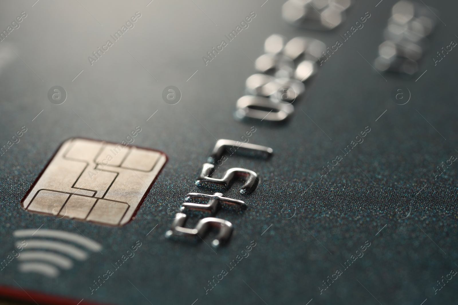 Photo of Plastic credit card as background, macro view