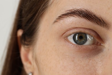 Macro photo of woman with beautiful eyes