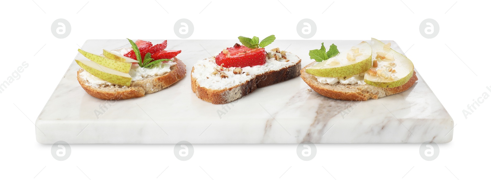 Photo of Delicious bruschettas with fresh ricotta (cream cheese), strawberry, mint and pear isolated on white