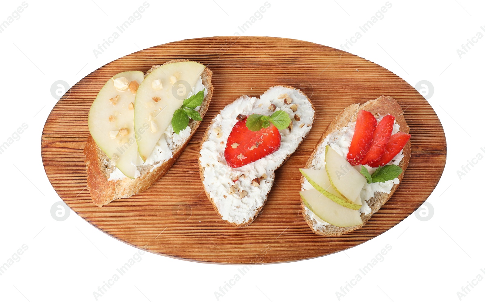 Photo of Delicious bruschettas with fresh ricotta (cream cheese), strawberry, mint and pear isolated on white, top view