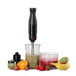 Photo of Hand blender kit, mixtures of ingredients and fresh fruits isolated on white