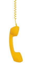 Yellow telephone handset with cord isolated on white