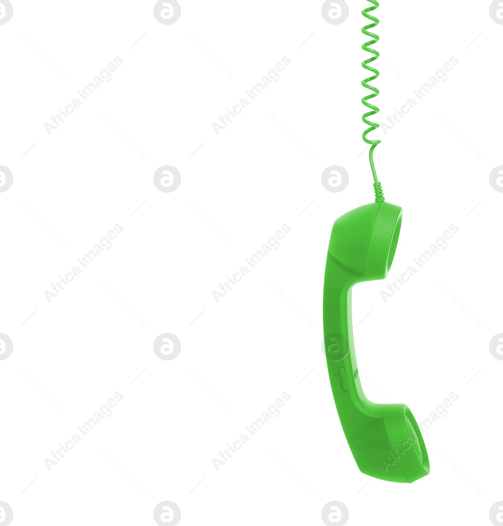 Image of Green telephone handset with cord isolated on white