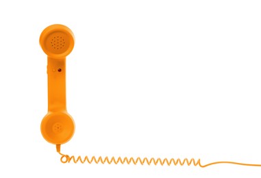 Image of Orange telephone handset with cord isolated on white