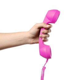 Image of Woman holding pink telephone handset on white background, closeup